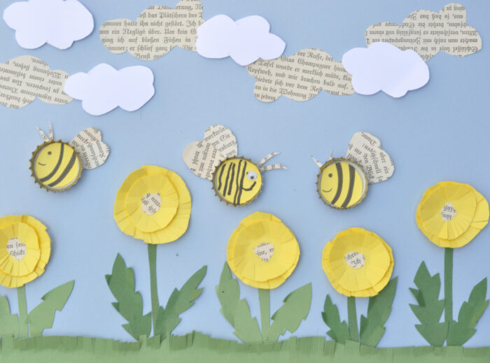 Bienen-Spiel-Bild - Aus Kronkorken und Magneten basteln wir fliegende Kronkorkenbienchen. Diese lassen sich über das Bild schieben und fliegen munter umher. 